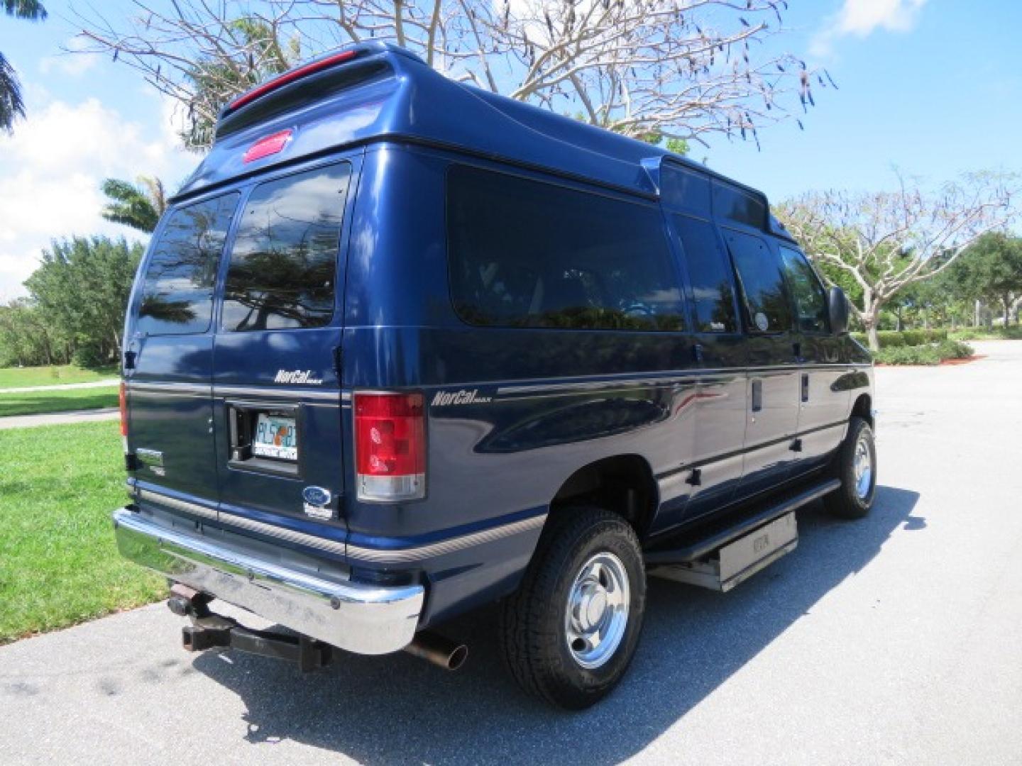 2011 Dark Blue /Gray Ford E-Series Wagon E-350 XLT Super Duty (1FBNE3BS4BD) with an 6.8L V10 SOHC 20V engine, located at 4301 Oak Circle #19, Boca Raton, FL, 33431, (954) 561-2499, 26.388861, -80.084038 - You are looking at a Gorgeous 2011 Ford Econoline E350 XLT Norcal Max High Top Handicap Wheelchair Conversion Van with 6.8L V10, 15K Original Miles, 9 Inch Lowered Floor, Braun UVL Side Entry Wheelchair Lift, Remote Control Power Side Entry Doors, Expanded Side Entry Doors, Q Straint Tie Down, Syste - Photo#15